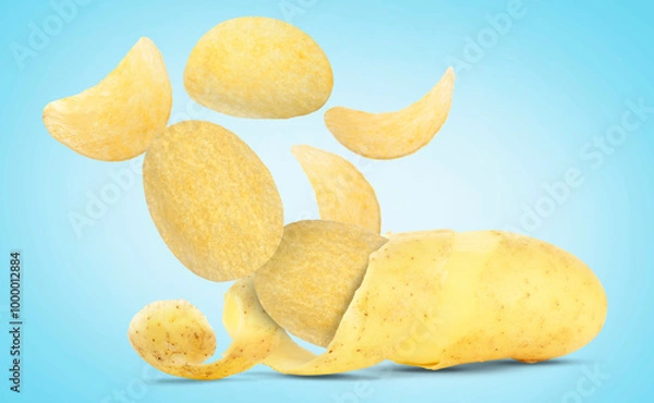 Fototapeta Raw potato turning into tasty crispy chips on light blue gradient background