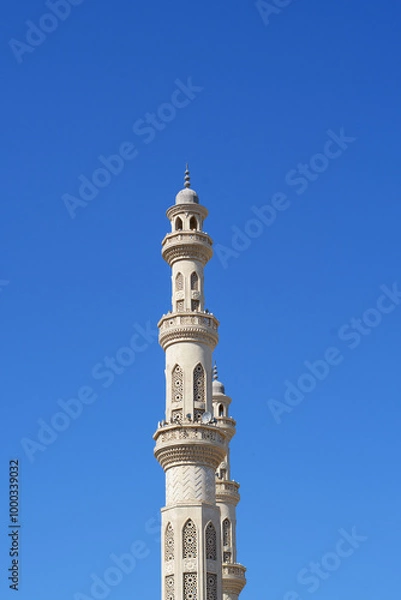 Fototapeta Hurghada, Egypt 202 tall minarets of the El Mina Mosque, the structure is very beautiful, the main cultural and religious attraction in Hurghada, the largest and largest mosque in the city.