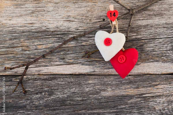 Obraz Two hearts on branch on wooden background. Valentine day card. Copy space, 
