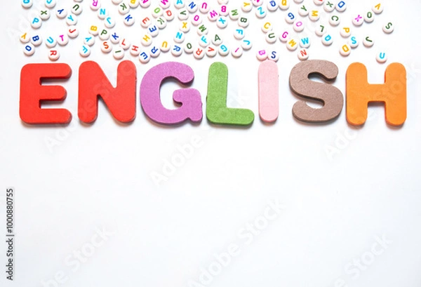 Fototapeta English letters scattered on white background with space for design. Language learning concept.