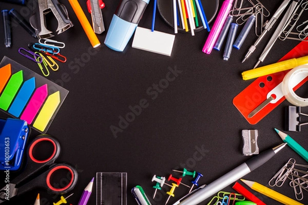 Obraz Office supplies around black space