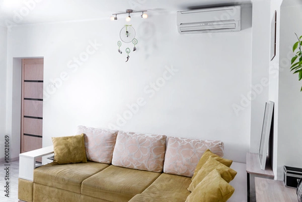 Fototapeta Modern simple interior in light apartments. Living room interior