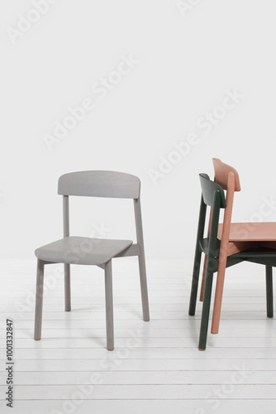 Fototapeta three modern design chairs with backrest in apartment interior