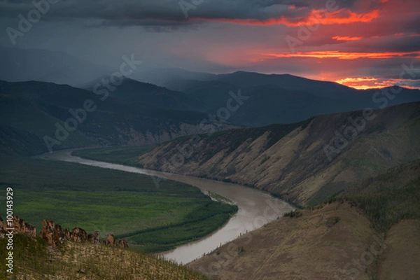 Fototapeta Dawn over the river Indigirka. View from above. Yakutia. Russia.