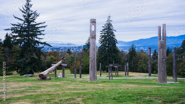 Fototapeta Panoramic view, looking West from Burnaby Mountain Park, BC, on a cloudy autumn day, with Vancouver skyscrapers visible on horizon and North Shore mountains at right.