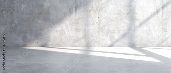 Fototapeta Sleek Concrete Chamber, an expansive, minimalistic space featuring stark concrete walls, a smooth floor, and distinct shadows casting dramatic patterns on the surfaces.