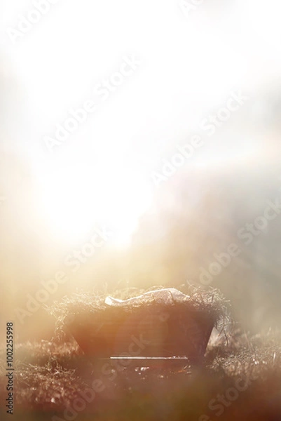 Obraz A bright light shines in the manger blessing the baby Jesus, the birth background of Jesus commemorating Christmas and Christmas
