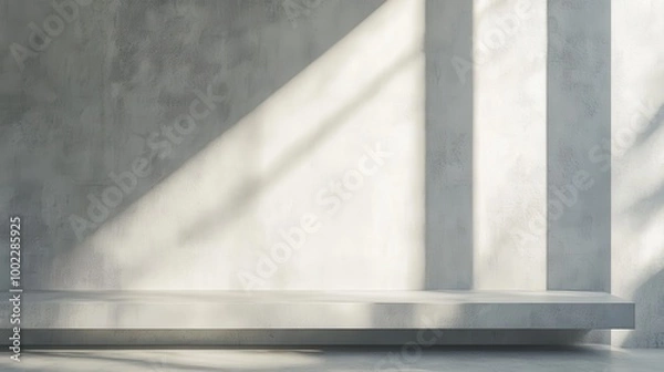Fototapeta A minimalist interior with textured walls and natural light casting shadows.