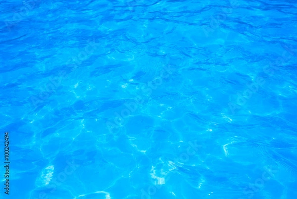 Obraz Blue pool water with sun reflections