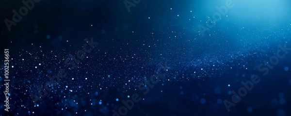 Fototapeta Dark blue background with glowing lights and bokeh, creating an atmosphere of mystery and magic.