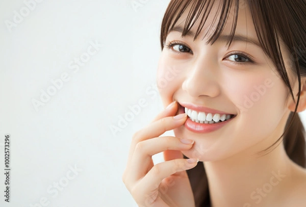 Fototapeta 白い歯を見せる女性