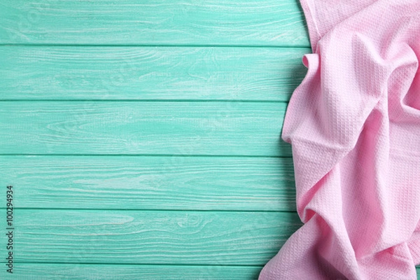 Fototapeta Napkin on mint wooden table, close up