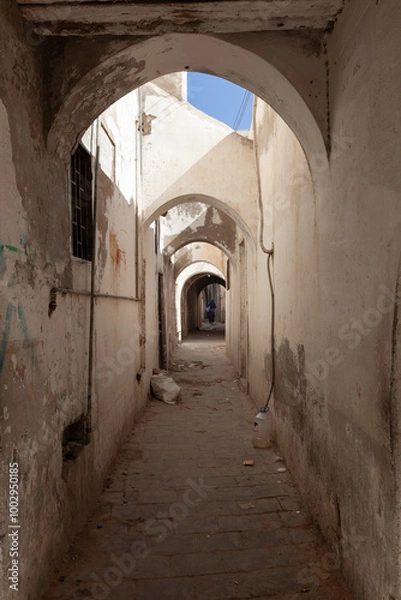 Fototapeta Tripoli, Libya, 4 November 2009.  A pedestrian street in the old city, Ghadema, in Tripoli. Arches make a big part of the architecture of the old city.