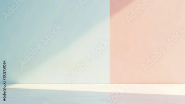 Fototapeta Soft sunlight filters through a window, casting shadows on pastel walls and white floors. Modern, elegant room perfect for creative projects