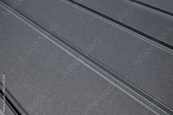 Fototapeta Close-up house retro roof panel with standing seam and fasteners. Modern galvanized steel roofing sheet with ribs. Classic style black metal panel with rebate joint. Falz roofing. Building's covering