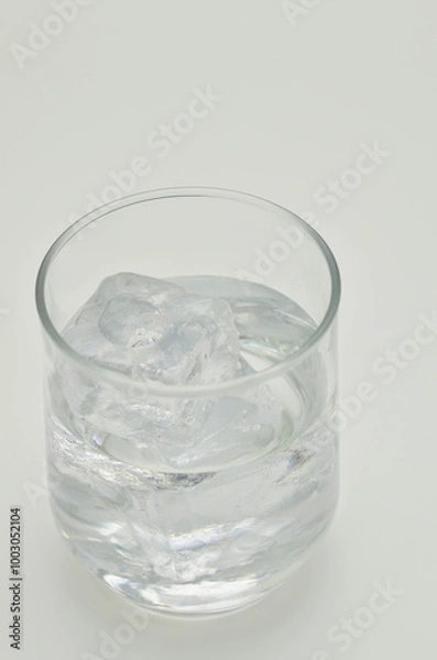 Fototapeta Glass of water with Ice cubes