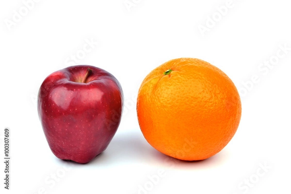 Obraz Orange and apple on white background