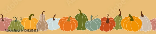 Fototapeta Autumn endless border with colorful pumpkins on a yellow background. Hand-drawn illustration for textiles, packaging, paper. Seamless vector background. Seamless Repeat Pattern.