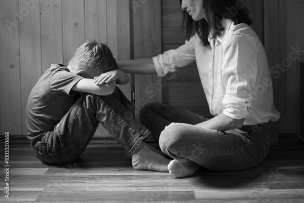 Obraz Parent comforting helping sad emotional child at home, concept of bullying, stress disappointment, sadness.
