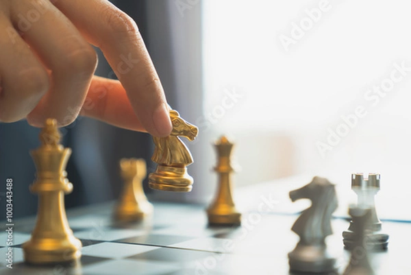 Fototapeta Businessman planning strategy with chess figures, leadership assignment concept.