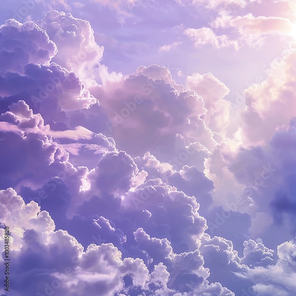 Fototapeta Dreamy Sunset Sky with Fluffy Purple Clouds Illuminated by Golden Light, Creating a Serene and Ethereal Atmosphere.