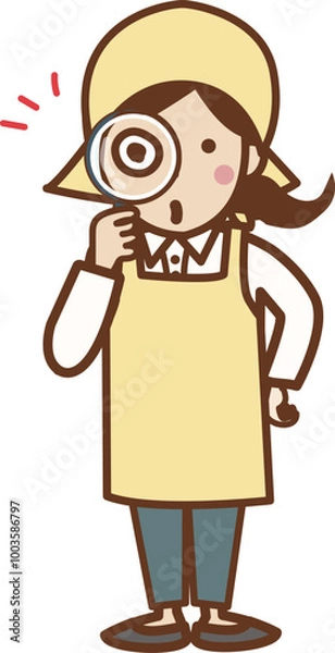 Obraz 虫眼鏡で見るエプロン姿の若い女性。