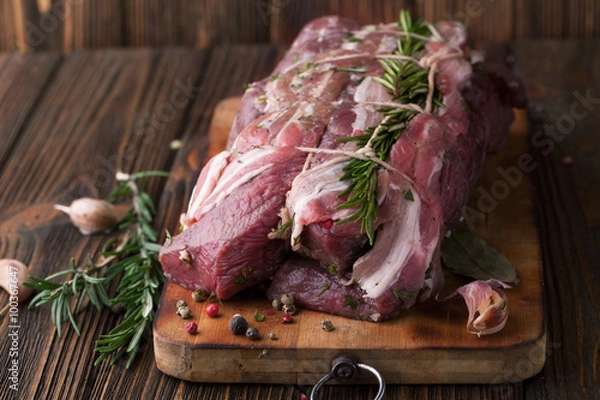 Obraz Raw beef roll with fresh spices
