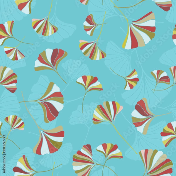 Obraz A seamless pattern of ginkgo leaves in  various colors on a blue background, a variation of hand-drawn ginkgo leaves