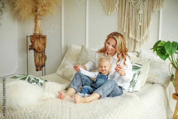 Obraz Happy loving family. Mother and her daughter child girl playing and hugging.