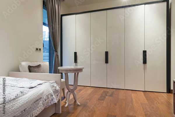 Fototapeta Bedroom interior with large closet
