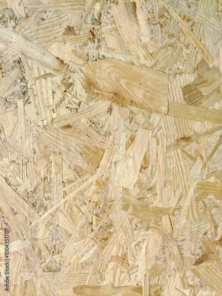 Fototapeta Close-up of a pressed wood panel with a nice fiber structure on the whole background. Building and finishing material