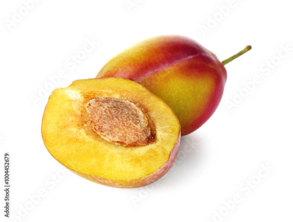 Fototapeta Whole and cut ripe plums isolated on white