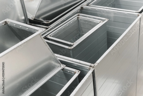 Fototapeta Ventilation rectangular ducts and pipeline parts on store outdoors.