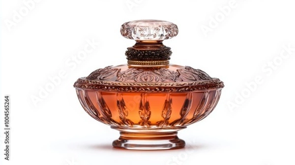 Fototapeta Elegant vintage perfume bottle with intricate design filled with amber-colored liquid, isolated on white background.