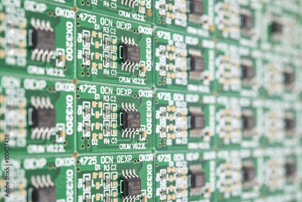 Obraz Computer chips on green circuit board