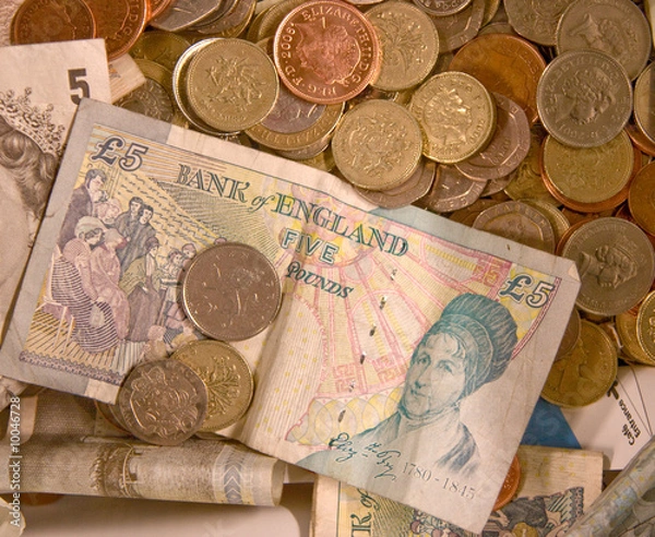 Fototapeta Five pound note and change with a cafe brochure