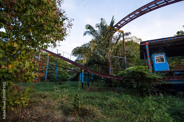 Obraz Rusty decayed roller coaster tracks at Yangon abandoned amusement park
