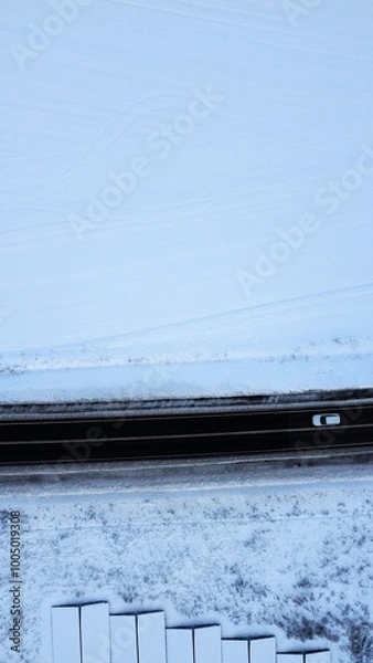 Obraz driving on a snowy highway 