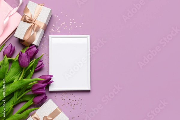 Fototapeta Photo frame with purple tulips on color background