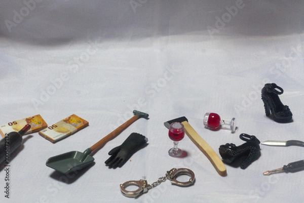 Obraz True crime scene concept, killing items like knife or axe, glass of wine, handcuffs on the grey background