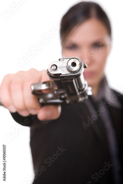 Fototapeta attractive brunette woman with gun on white background