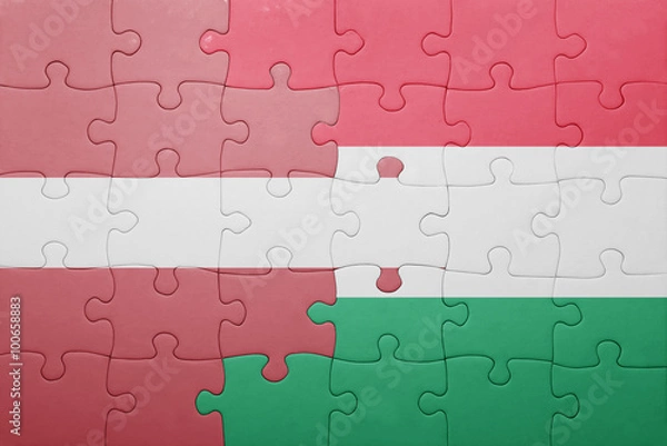 Fototapeta puzzle with the national flag of latvia and hungary