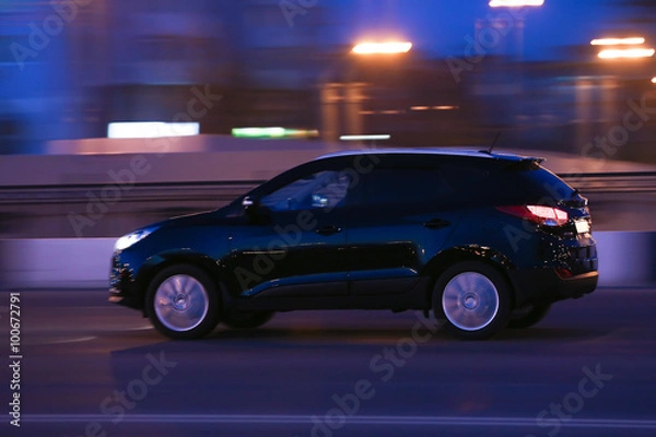 Fototapeta cars go on night city