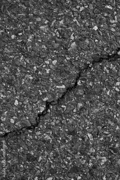 Fototapeta Road surface cracks or collapsed ea