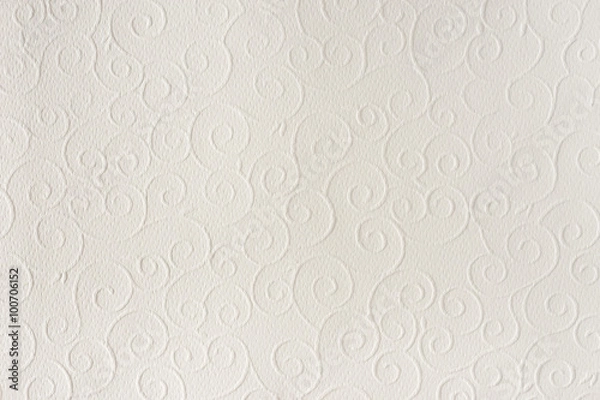 Fototapeta Old white, beige paper sheet texture background. Shells, waves, circles, shapes embossed pattern. Strong light, shadows.