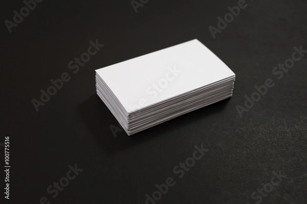 Obraz blank business cards stack up on Black background