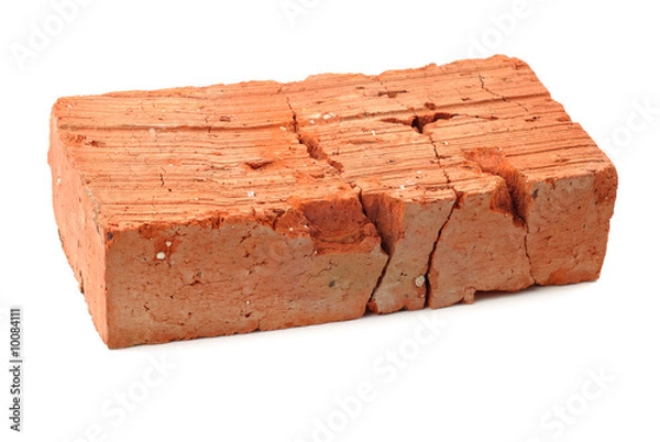 Obraz Cracked red brick isolated over white background