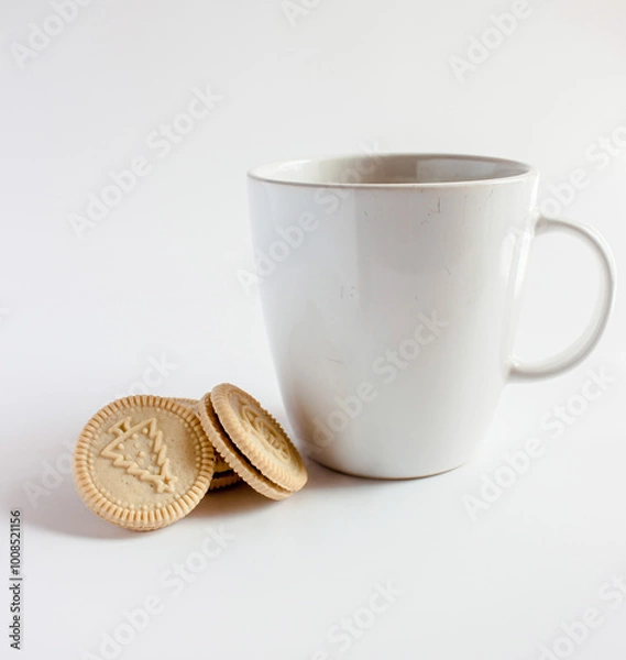 Fototapeta Cup of coffee with Round  Christmas cookies. Vanilla or butter sandwich cookies.