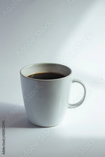 Fototapeta Cup of coffee on white  background. Close up.