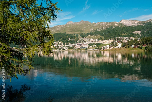 Obraz Scenic view on the St. Moritz mountain lake with the alpine resort on the other side on a bright summer day. Canton Grisons, Switzerland